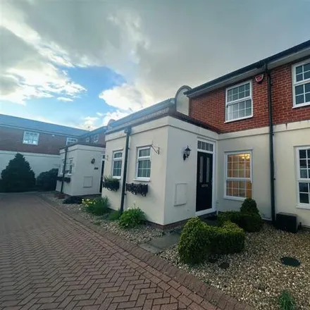 Rent this 2 bed townhouse on Belgrave Court in Bawtry, DN10 6SA
