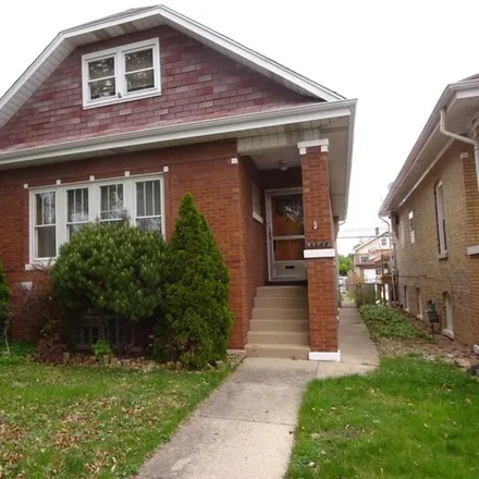 Buy this 4 bed house on 6048 West Waveland Avenue in Chicago, IL 60634