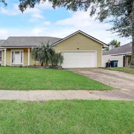 Buy this 4 bed house on 8547 White Rose Drive in Orange County, FL 32818