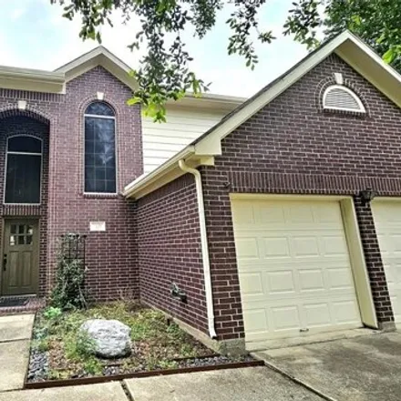 Rent this 4 bed house on 3121 English Oaks Boulevard in Pearland, TX 77584