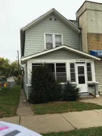 Rent this 3 bed house on 722 E 6th Street