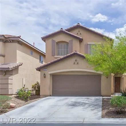 Buy this 4 bed house on 6940 Willow Warbler Street in North Las Vegas, NV 89084