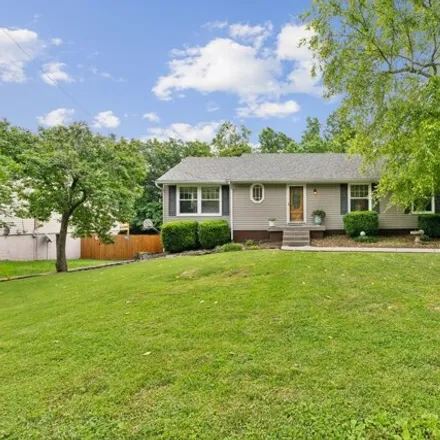 Buy this 3 bed house on 154 Timberlake Drive in Rolling Acres, Hendersonville