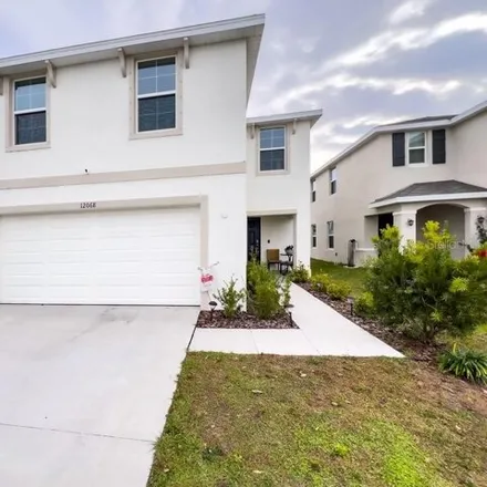 Rent this 4 bed house on Downy Birch Drive in Hillsborough County, FL 33579