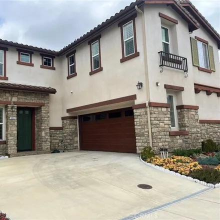 Rent this 4 bed house on 9962 Stonehaven Place in Cypress, CA 90630