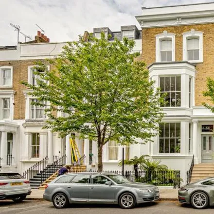 Buy this 4 bed townhouse on 66 Blenheim Crescent in London, W11 2EQ