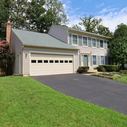 Rent this 4 bed house on 9605 Oakington Drive in Fairfax County, VA 22039