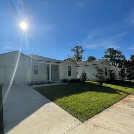 Rent this 3 bed house on 4116 Northeast 1st Drive in Gainesville, FL 32609