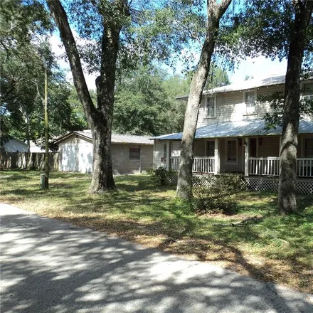 Buy this 4 bed house on 133 West Phelps Street in Groveland, FL 34736