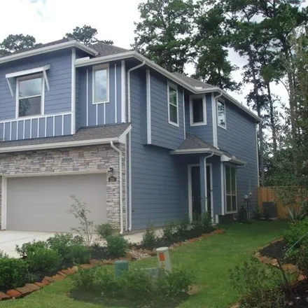 Rent this 3 bed townhouse on 285 Moon Dance Court in Conroe, TX 77304