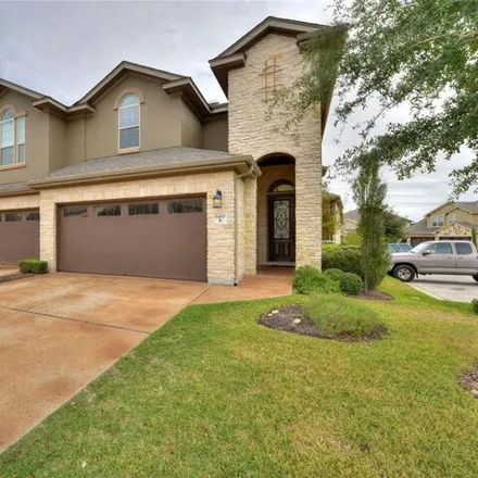 Rent this 3 bed townhouse on 9400 Solana Vista Loop Unit B in Austin, Texas
