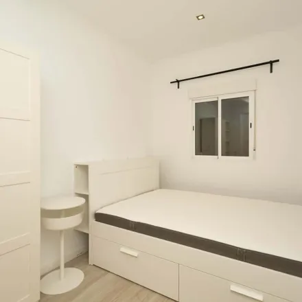 Rent this 7 bed room on Rua Carrilho Videira in 1170-347 Lisbon, Portugal