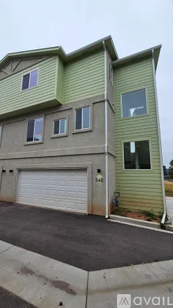 Rent this 3 bed townhouse on 540 E Grace Ave
