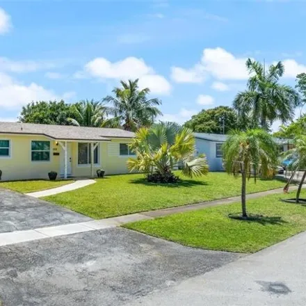 Rent this 3 bed house on 1398 Southeast 1st Avenue in Coral Manor, Deerfield Beach