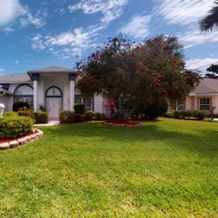 Rent this 3 bed apartment on 14 Clearview Court North in Country Club Cove, Palm Coast