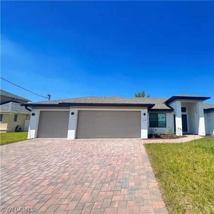 Rent this 3 bed house on Northwest 14th Street in Cape Coral, FL 33993