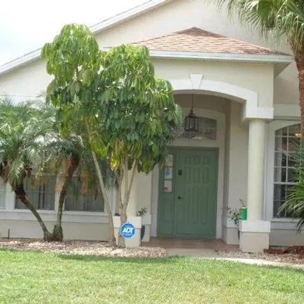 Buy this 4 bed house on 3369 Lake View Circle in Melbourne, FL 32934