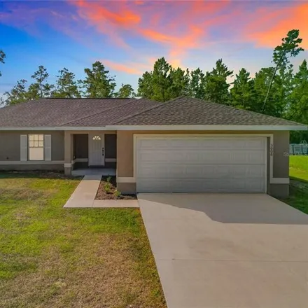Buy this 4 bed house on 3004 Southwest 168th Loop in Marion County, FL 34473