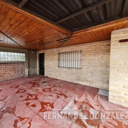 Buy this 3 bed house on Córdoba 411 in Partido de Lomas de Zamora, 1828 Banfield