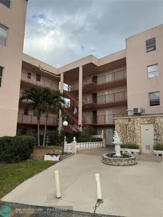 Rent this 2 bed condo on Northwest 29th Street in East Gate Park, Lauderdale Lakes