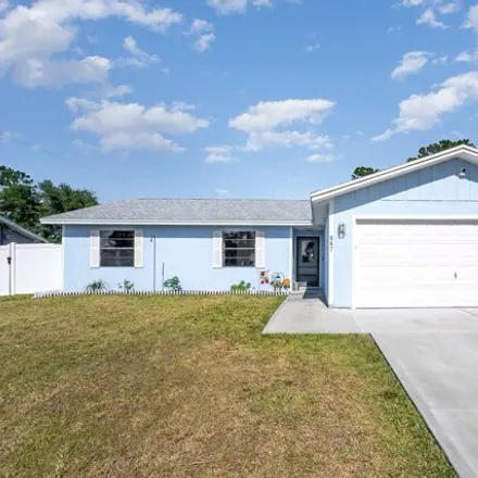 Buy this 3 bed house on 867 Gera Avenue Northwest in Palm Bay, FL 32907