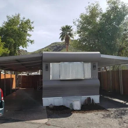 Buy this studio apartment on 2 Saturn Street in Palm Springs, CA 92264