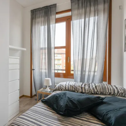 Rent this 5 bed room on Piazza Bolivar in Via Lorenteggio, 20146 Milan MI