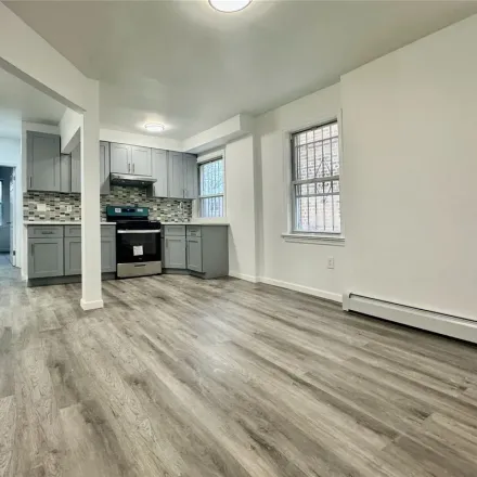 Rent this 3 bed apartment on 50-50 67th Street in New York, NY 11377