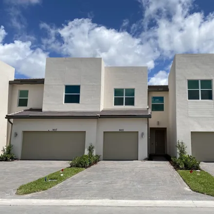 Rent this 3 bed townhouse on 23401 Savona Court in Boca Pointe, Palm Beach County