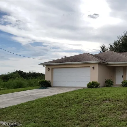 Buy this 3 bed house on 523 Wabasso Avenue in Lehigh Acres, FL 33974