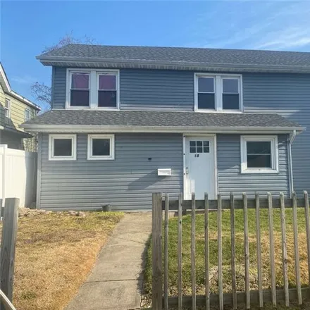 Rent this 3 bed house on 18 Clinton Avenue in Inwood, NY 11096