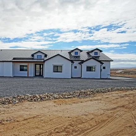 Buy this 4 bed house on 1237 Viga Road Southeast in Rio Rancho, NM 87124