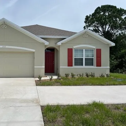 Rent this 4 bed house on 311 Sw Becker Rd in Port Saint Lucie, Florida