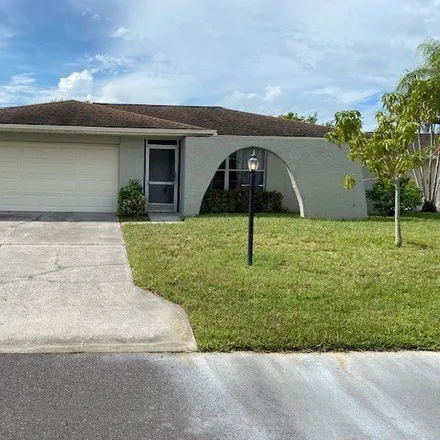 Buy this 3 bed house on 9767 Owlclover Street in Cypress Lake, FL 33919