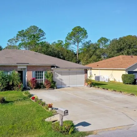 Buy this 4 bed house on 26 Princess Dolores Lane in Palm Coast, FL 32164