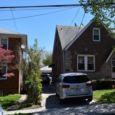 Buy this 5 bed house on 85-11 148th Street in New York, NY 11435