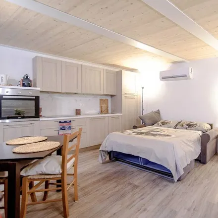 Rent this studio apartment on Torno in Como, Italy