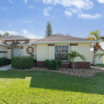 Buy this 3 bed house on 323 Northwest 7th Place in Cape Coral, FL 33993