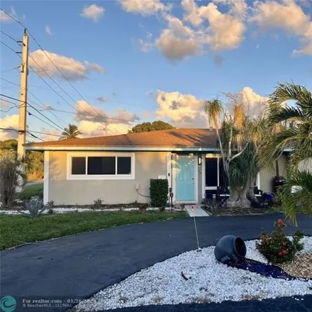 Rent this 3 bed house on 800-832 Northeast 8th Street in Harbor Village, Pompano Beach