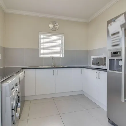 Rent this 4 bed apartment on Woodlands Drive in Goedemoed, Western Cape