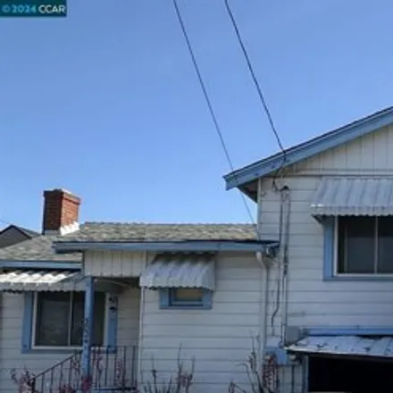 Buy this 4 bed house on 5824 Walnut Street in Oakland, CA 94613