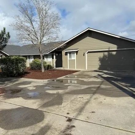 Buy this 4 bed house on 2056 Redwood Avenue in Grants Pass, OR 97527