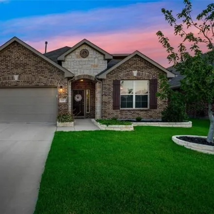 Rent this 4 bed house on 610 Bird Creek Drive in Denton County, TX 75068