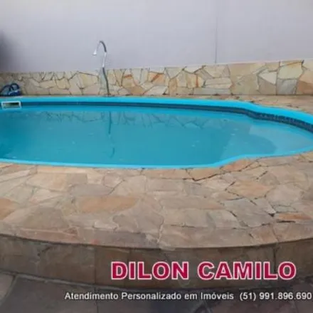 Buy this 4 bed house on Rua Montenegro in Rio Branco, Canoas - RS