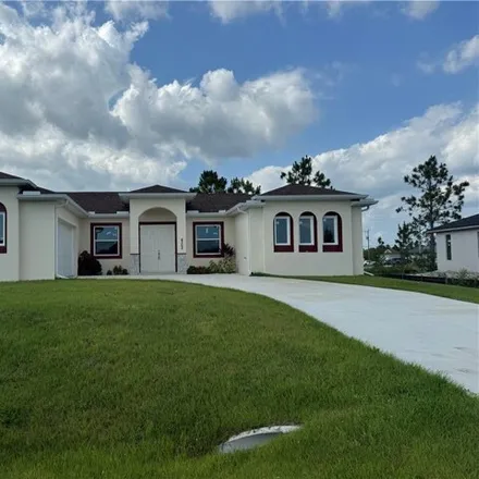 Buy this 3 bed house on 4302 11th Street West in Lehigh Acres, FL 33971