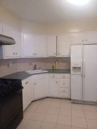 Rent this 2 bed house on 150-09 89th Street in New York, NY 11414