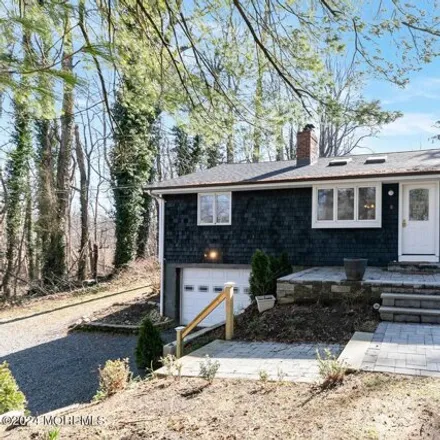 Buy this 4 bed house on 344 Navesink River Road in Middletown Township, NJ 07701
