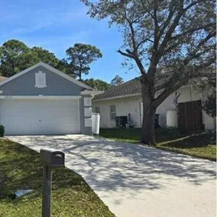Buy this 3 bed house on 2629 Tepee Avenue Southeast in Palm Bay, FL 32909