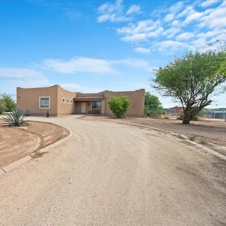 Buy this 4 bed house on 22632 West Dusty Wren Road in Maricopa County, AZ 85361