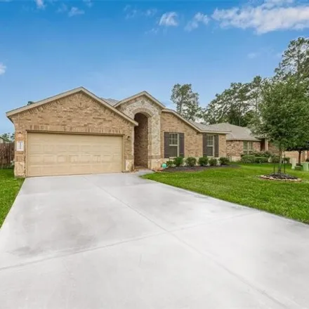 Buy this 4 bed house on 14093 South Wind Cave Court in Montgomery County, TX 77384
